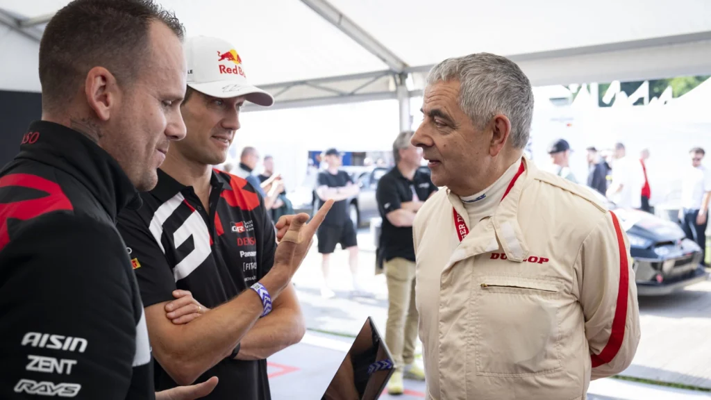 Rowan Atkinson talking hydrogen with Toyota engineers at Goodwood Festival of Speed 2024