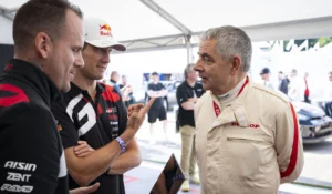 Rowan Atkinson talking hydrogen with Toyota engineers at Goodwood Festival of Speed 2024