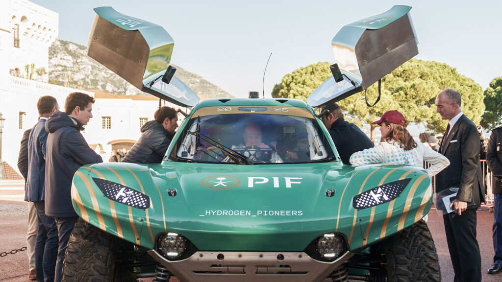 H.S.H Prince Albert II of Monaco gets to grips with the controls of Extreme E's hydrogen car. (Image: Extreme E)