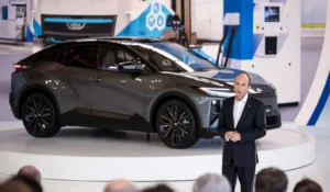 Matt Harrison, Toyota Motor Europe, stands before a Toyota car with a hydrogen refuelling backdrop. (Image: Toyota Motor Europe)