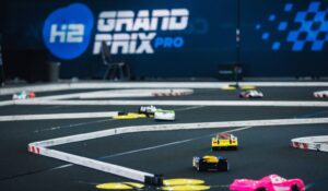 Hydrogen-powered model race cars compete on a tight technical track at the H2GP Finals.