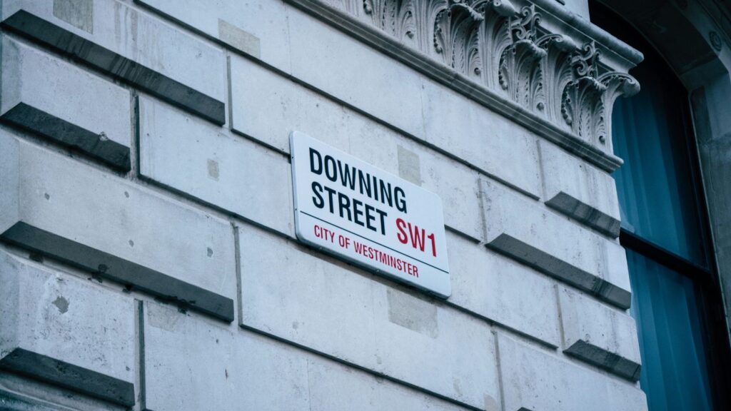 Street sign for Downing Street in Westminster, London, used in article on UK hydrogen pipeline licence exemptions.