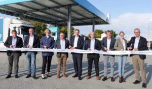 Officials and project partners cut the ribbon at the opening of the HYCEL hydrogen refuelling station in Hürup, Germany, developed by GP JOULE as part of the eFarm project.