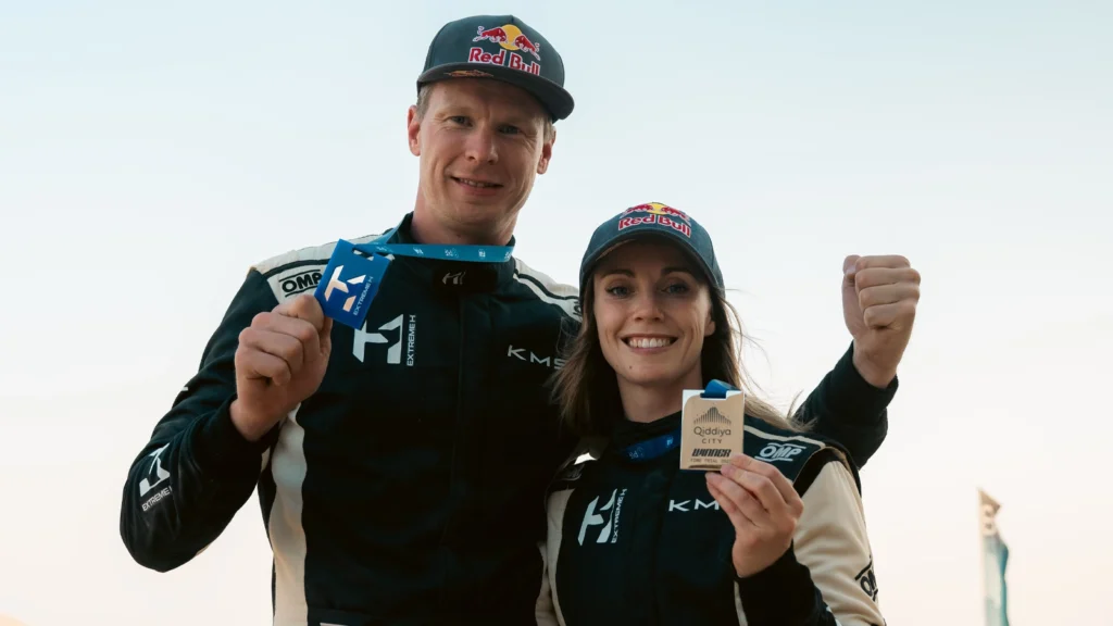 Extreme H day one winner team KMS hold their medals. (Image: Extreme H)