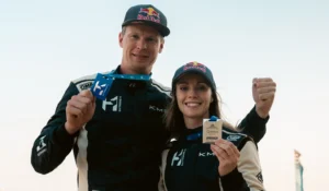 Extreme H day one winner team KMS hold their medals. (Image: Extreme H)