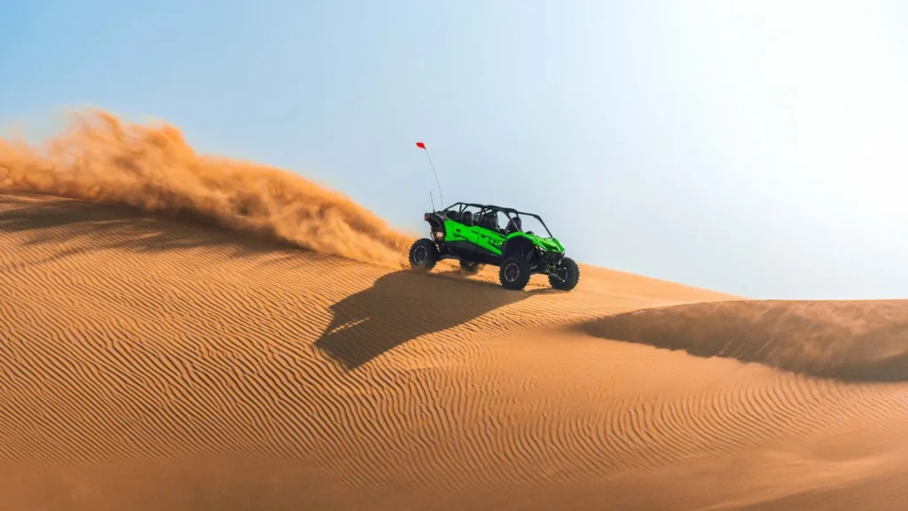 Kawasaki Teryx H2 Hydrogen Edition climbing golden sand dunes at speed