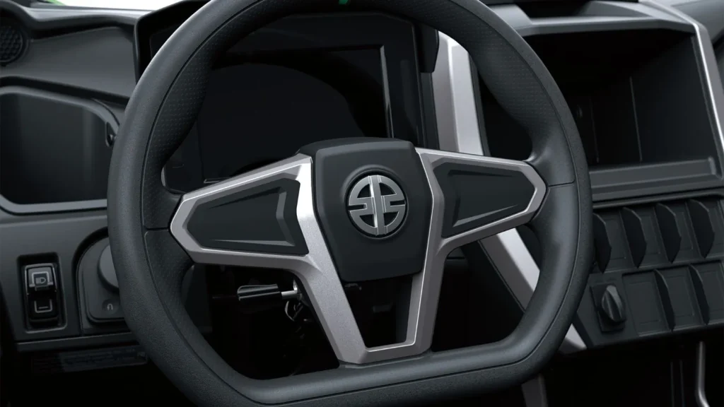 Close-up of Kawasaki Teryx H2 hydrogen UTV steering wheel and controls