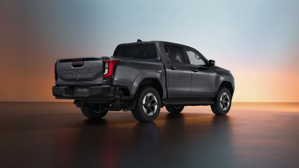 Rear view of the Toyota Hilux BEV showing redesigned LED tail lights and TOYOTA tailgate branding