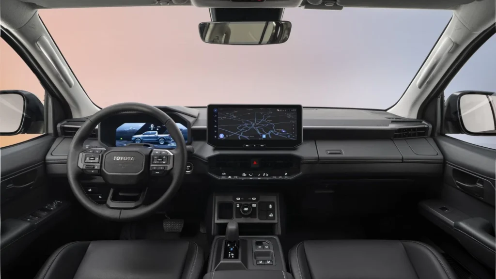 Close-up of Toyota Hilux BEV shift-by-wire selector and off-road control buttons