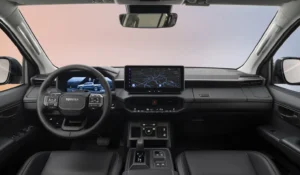 Close-up of Toyota Hilux BEV shift-by-wire selector and off-road control buttons