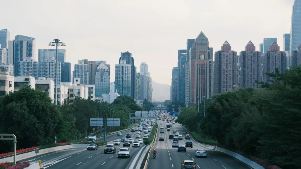 Shenzhen city highway with modern buildings and traffic in China